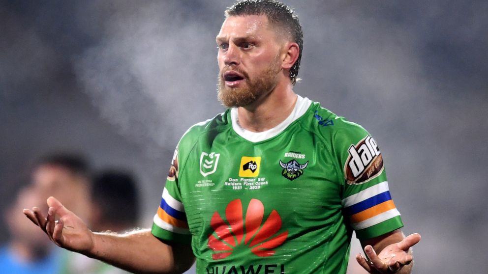 Elliott Whitehead of the Canberra Raiders National Rugby League team raises his arms after his try was disallowed during a match against the Melbourne Storm in Canberra, Australia, July 11, 2020. Chinese telecom giant Huawei announced on Monday, Aug.