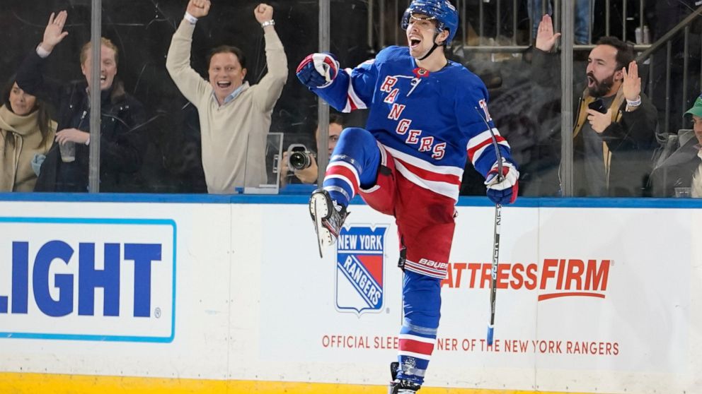 New York Rangers center Filip Chytil reacts after scoring the game winning goal during overtime of an NHL hockey game against the New Jersey Devils, Monday, Dec. 12, 2022, at Madison Square Garden in New York. The Rangers won 4-3. (AP Photo/Mary Altaffer)