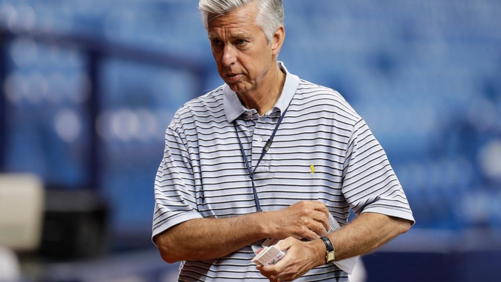 FILE - This March 30, 2018, file photo shows Dave Dombrowski, President of Baseball Operations for the Boston Red Sox, before a baseball game between the Tampa Bay Rays and the Red Sox in St. Petersburg, Fla. The Red Sox have parted ways with Dombrow