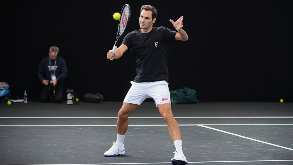 Switzerland's Roger Federer attends a training session ahead of the Laver Cup tennis tournament at the O2 in London, Wednesday, Sept. 21, 2022. Federer appeared earlier at a news conference to discuss his retirement from professional tennis at age 41