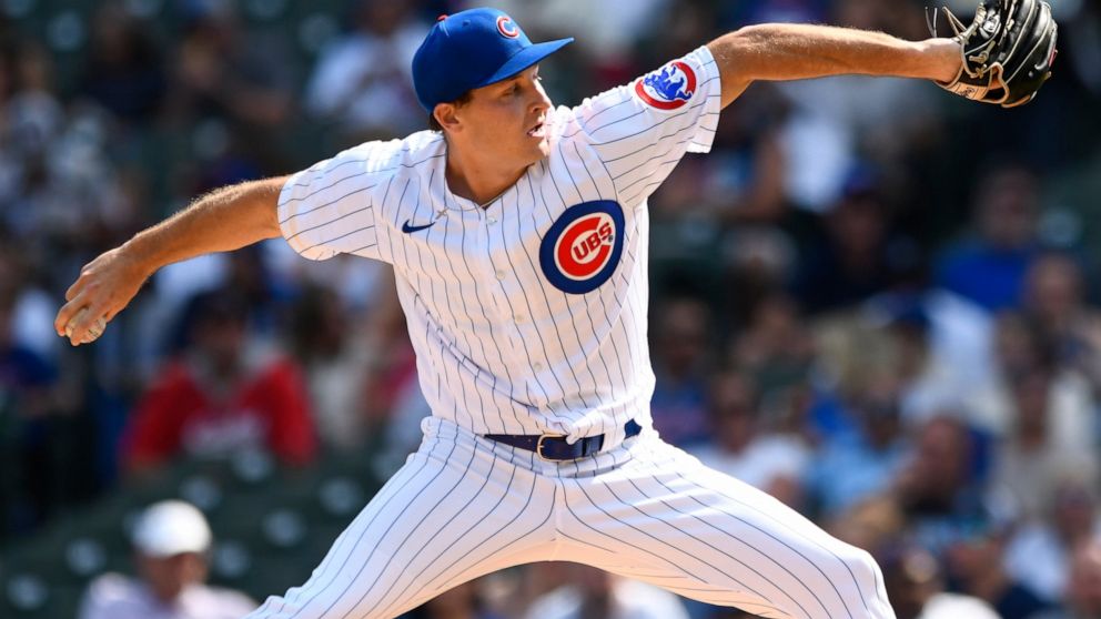 Chicago Cubs starter Hayden Wesneski delivers a pitch during the first inning of a baseball game against the Colorado Rockies Saturday, Sept. 17, 2022, in Chicago. (AP Photo/Paul Beaty)