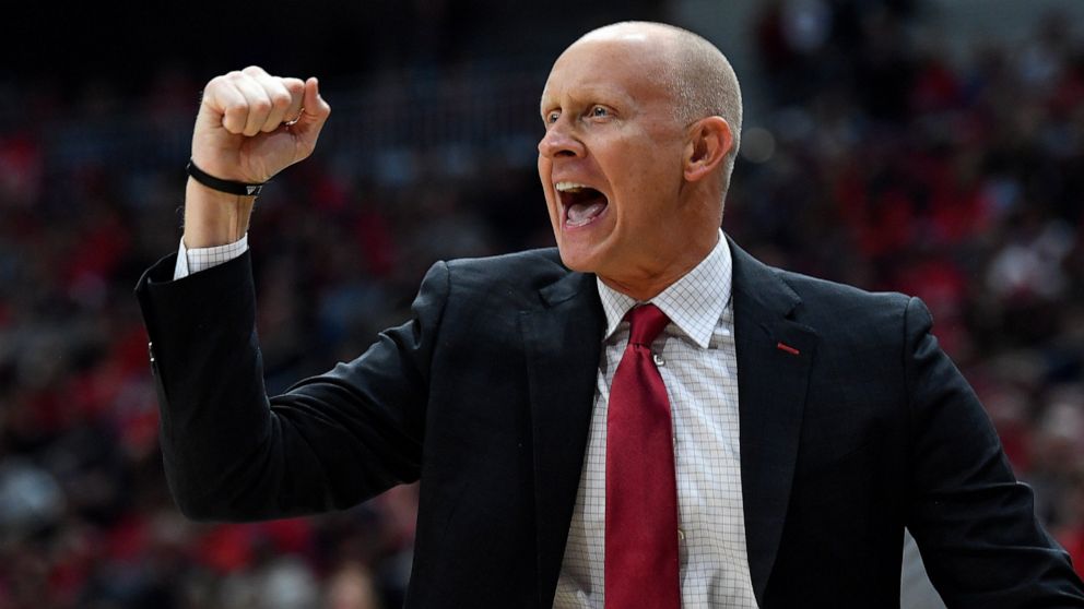 Louisville head coach Chris Mack reacts to a play during the first half of an NCAA college basketball game in Louisville, Ky., Friday, Dec. 6, 2019. (AP Photo/Timothy D. Easley)