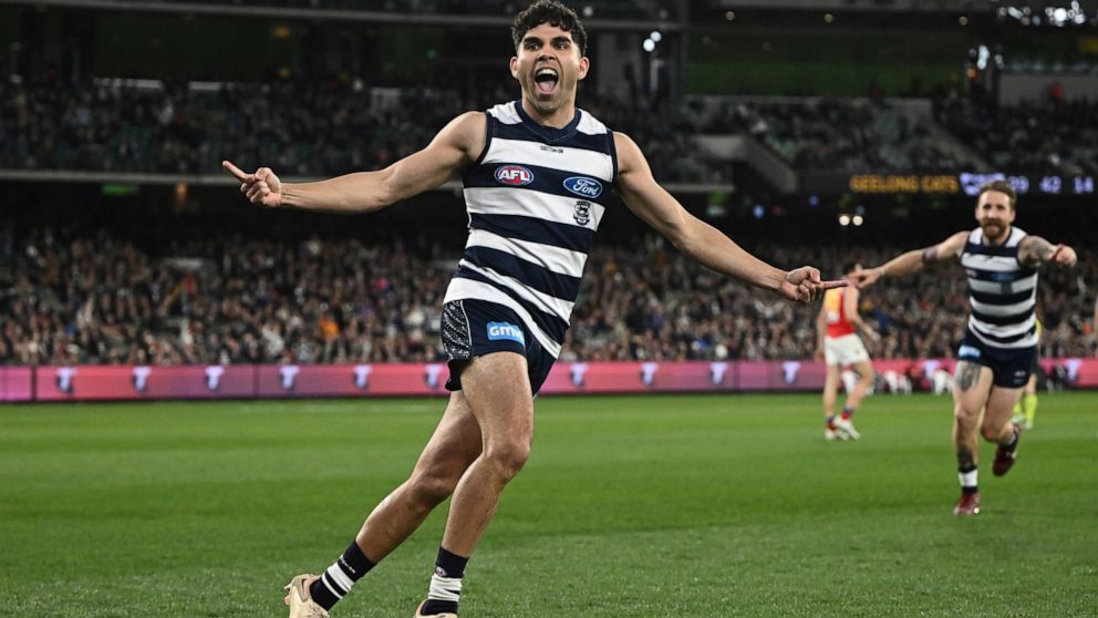 Tyson Stengle of Geelong celebrates kicking a goal during the AFL Preliminary Final match between the Geelong Cats and the Brisbane Lions at the Melbourne Cricket Ground in Melbourne, Friday, Sept. 16, 2022. Early Saturday morning, at a half past mid