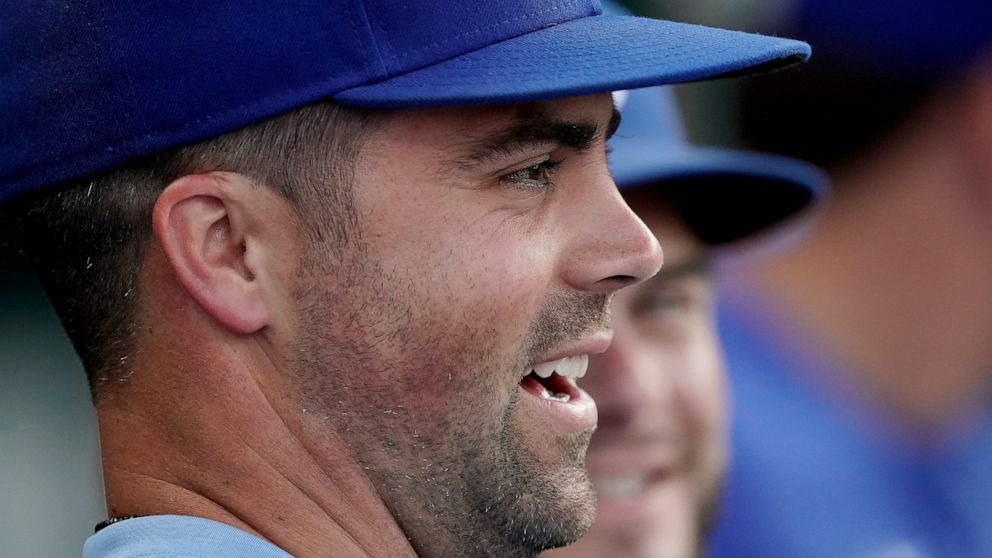 Kansas City Royals' Whit Merrifield watches from the dugout during the second inning of the second game of a baseball doubleheader against the Detroit Tigers Monday, July 11, 2022, in Kansas City, Mo. Today marked the first day Merrifield has missed