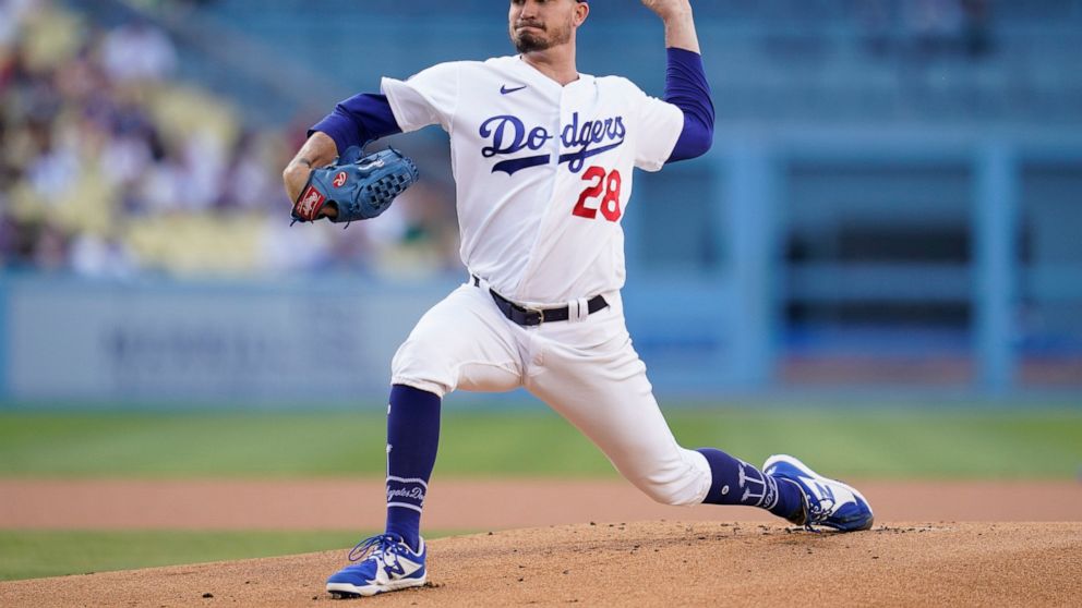 Los Angeles Dodgers starting pitcher Andrew Heaney (28) throws during the first inning of a baseball game against the Milwaukee Brewers in Los Angeles, Wednesday, Aug. 24, 2022. (AP Photo/Ashley Landis)