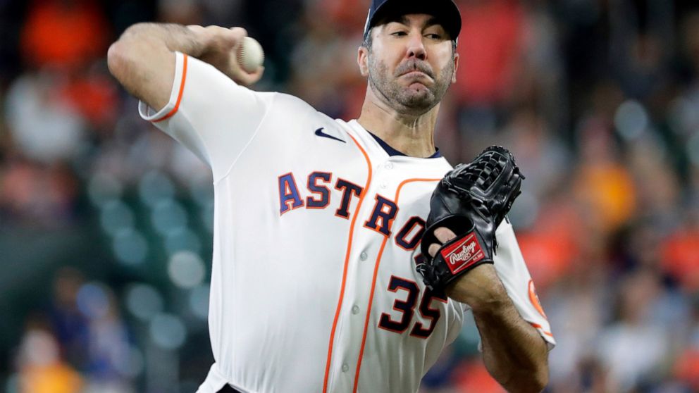 Houston Astros starting pitcher Justin Verlander (35) throws against the Kansas City Royals during the first inning of a baseball game Thursday, July 7, 2022, in Houston. (AP Photo/Michael Wyke)
