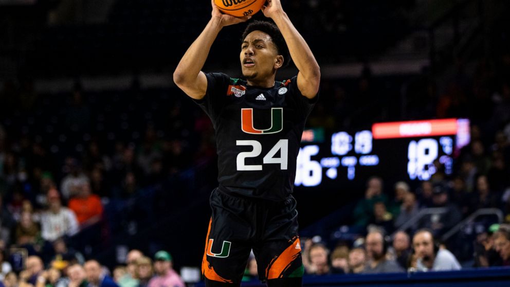 Miami's Nijel Pack (24) shoots during the first half of an NCAA college basketball game against Notre Dame, Friday, Dec. 30, 2022 in South Bend, Ind. (AP Photo/Michael Caterina)