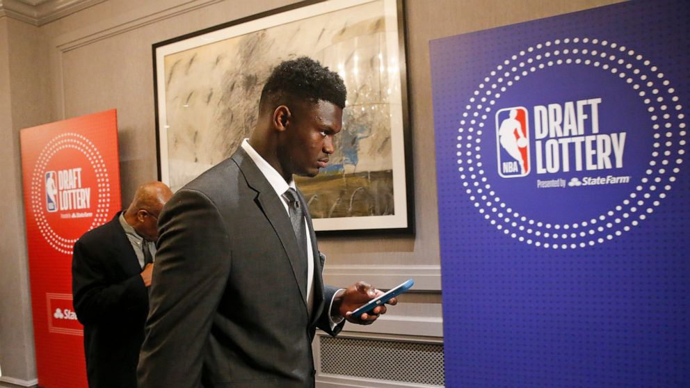 Duke's Zion Williamson arrives for the NBA basketball draft lottery Tuesday, May 14, 2019, in Chicago. (AP Photo/Nuccio DiNuzzo)