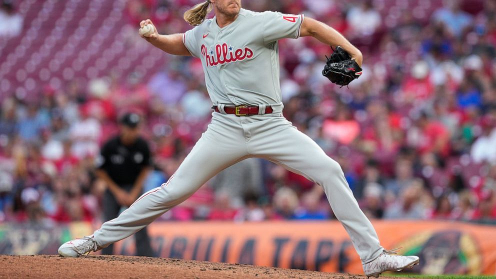 Philadelphia Phillies starting pitcher Noah Syndergaard throws during the third inning of the team's baseball game against the Cincinnati Reds on Monday, Aug. 15, 2022, in Cincinnati. (AP Photo/Jeff Dean)