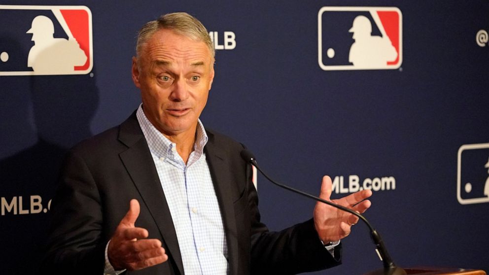 Major League Baseball commissioner Rob Manfred makes comments during a news conference at MLB baseball owners meetings, Thursday, Feb. 10, 2022, in Orlando, Fla. Manfred says spring training remains on hold because of a management lockout and his goa