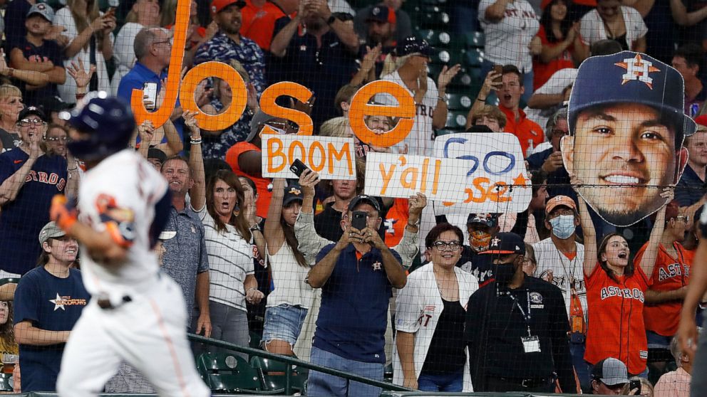 Fans cheer as Houston Astros Jose Altuve rounds the bases after hitting a solo home run off Cleveland Indians starting pitcher Triston McKenzie during the third inning of a baseball game Tuesday, July 20, 2021, in Houston. (Kevin M. Cox/The Galveston