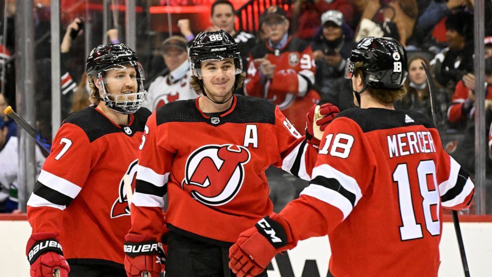 Hughes Bests Older Brother As Devils Rout Canucks 7 2 ABC News