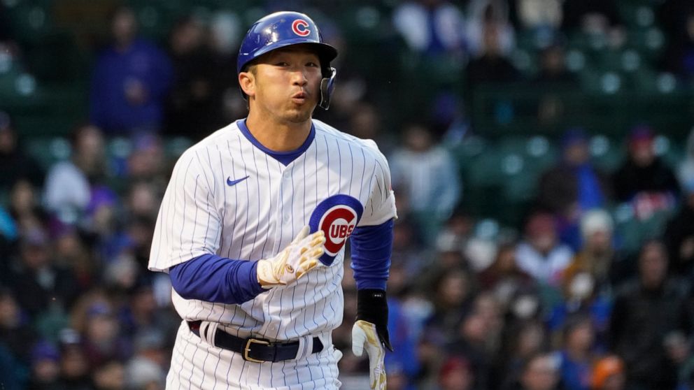 Chicago Cubs' Seiya Suzuki heads to first during the second inning of a baseball game against the Tampa Bay Rays Monday, April 18, 2022, in Chicago. (AP Photo/Charles Rex Arbogast)