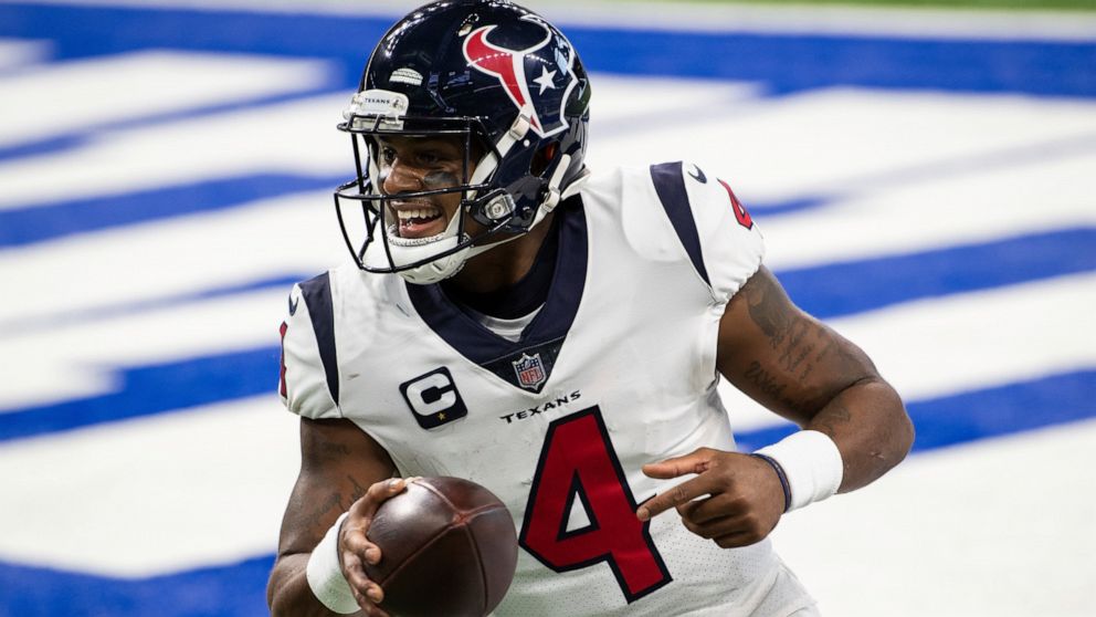 FILE - Houston Texans quarterback Deshaun Watson (4) celebrates a touchdown during the team's NFL football game against the Indianapolis Colts on Dec. 20, 2020, in Indianapolis. Several teams are scrambling to find a quarterback. Some of those, inclu