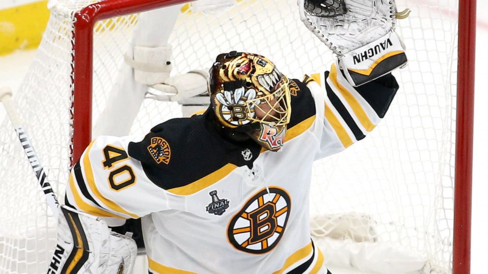Boston Bruins goaltender Tuukka Rask, of Finland, gloves a shot against the St. Louis Blues during the second period of Game 6 of the NHL hockey Stanley Cup Final Sunday, June 9, 2019, in St. Louis. (AP Photo/Scott Kane)
