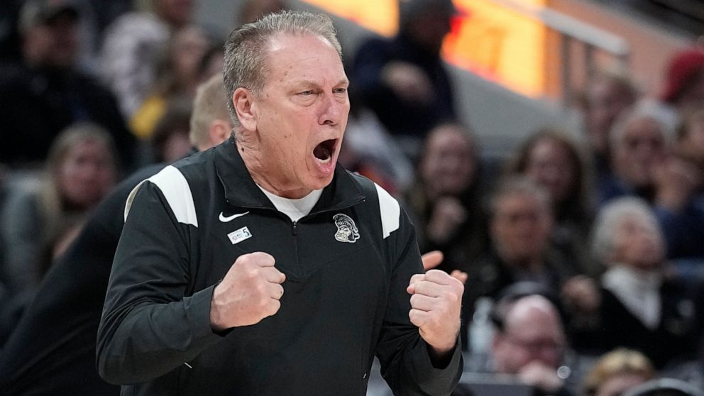 FILE - Michigan State coach Tom Izzo shouts during the second half of the team's NCAA college basketball game against Wisconsin at the Big Ten Conference men's tournament Friday, March 11, 2022, in Indianapolis. Michigan State has signed Izzo to a ne