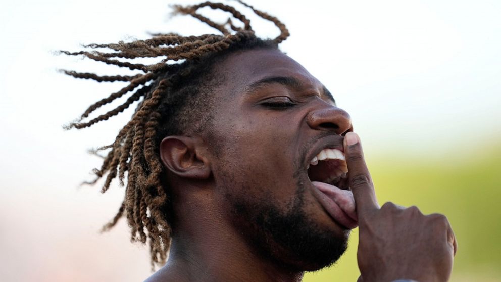 Noah Lyles, of the United States, wins a heat during the men's 200-meter semifinal run at the World Athletics Championships on Tuesday, July 19, 2022, in Eugene, Ore. (AP Photo/Ashley Landis)