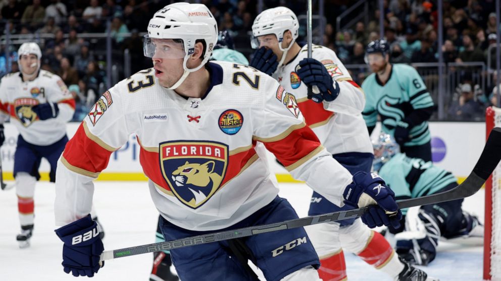 Florida Panthers center Carter Verhaeghe (23) skates from the goal after scoring his second goal of the night against the Seattle Kraken, during the first period of an NHL hockey game, Saturday, Dec. 3, 2022, in Seattle. (AP Photo/John Froschauer)