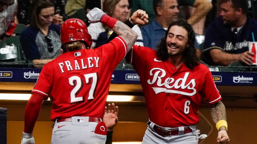 Cincinnati Reds' Jake Fraley celebrates his home run with Jonathan India during the ninth inning of a baseball game against the Milwaukee Brewers Friday, Sept. 9, 2022, in Milwaukee. (AP Photo/Morry Gash)