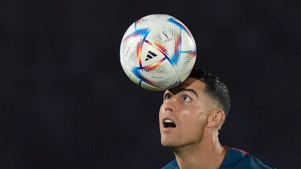 Portugal's Cristiano Ronaldo controls a ball during the Portugal's official training on the eve of the group H World Cup soccer match between Portugal and Ghana at the Al Shahaniya SC training site in Al Shahaniya, Qatar, Wednesday, Nov. 23, 2022. (A