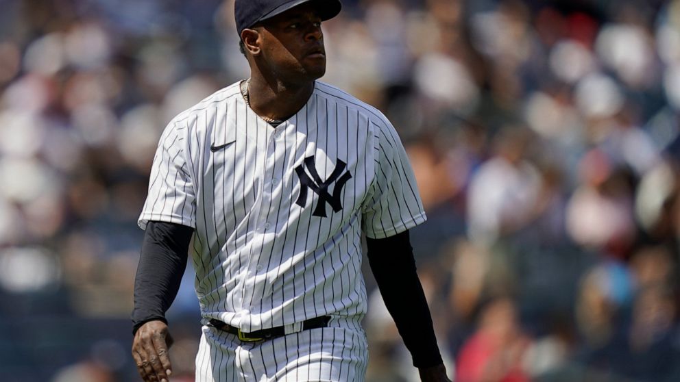 New York Yankees starting pitcher Luis Severino (40) walks back to the dugout during the change in the seventh inning of a baseball game against the Detroit Tigers, Saturday, June 4, 2022, in New York. (AP Photo/John Minchillo)