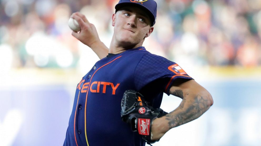 Houston Astros starting pitcher Hunter Brown throws against the Texas Rangers during the first inning of a baseball game, Monday, Sept. 5, 2022, in Houston. (AP Photo/Michael Wyke)