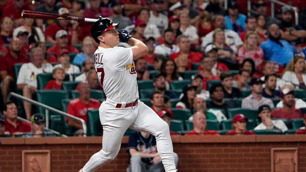 St. Louis Cardinals' Tyler O'Neill watches his three-run home run during the eighth inning of a baseball game against the Atlanta Braves Sunday, Aug. 28, 2022, in St. Louis. (AP Photo/Jeff Roberson)