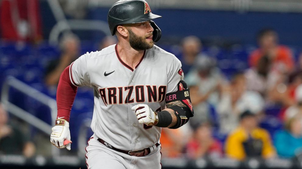 Arizona Diamondbacks Christian Walker (53) hits a home run during the second inning of a baseball game against the Miami Marlins, Tuesday, May 3, 2022, in Miami. (AP Photo/Marta Lavandier)