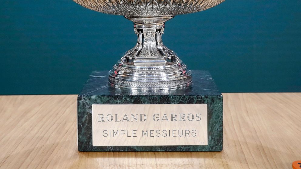 FILE - In this May 23, 2019, file photo, the names "Roland Garros" and the original tournament name "Internationaux de France" can be seen during the draw of the French Open tennis tournament at the Roland Garros stadium in Paris. English-speakers te