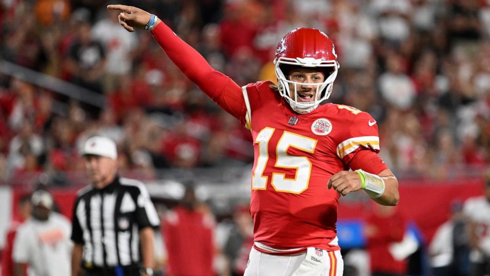 Kansas City Chiefs quarterback Patrick Mahomes (15) celebrates a touchdown during the first half of an NFL football game against the Tampa Bay Buccaneers Sunday, Oct. 2, 2022, in Tampa, Fla. (AP Photo/Jason Behnken)