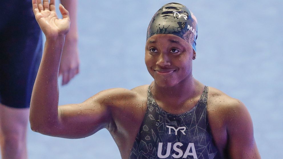 United States' Simone Manuel waves after winning the women's 100m freestyle final at the World Swimming Championships in Gwangju, South Korea, Saturday, July 27, 2019. (AP Photo/Mark Baker)