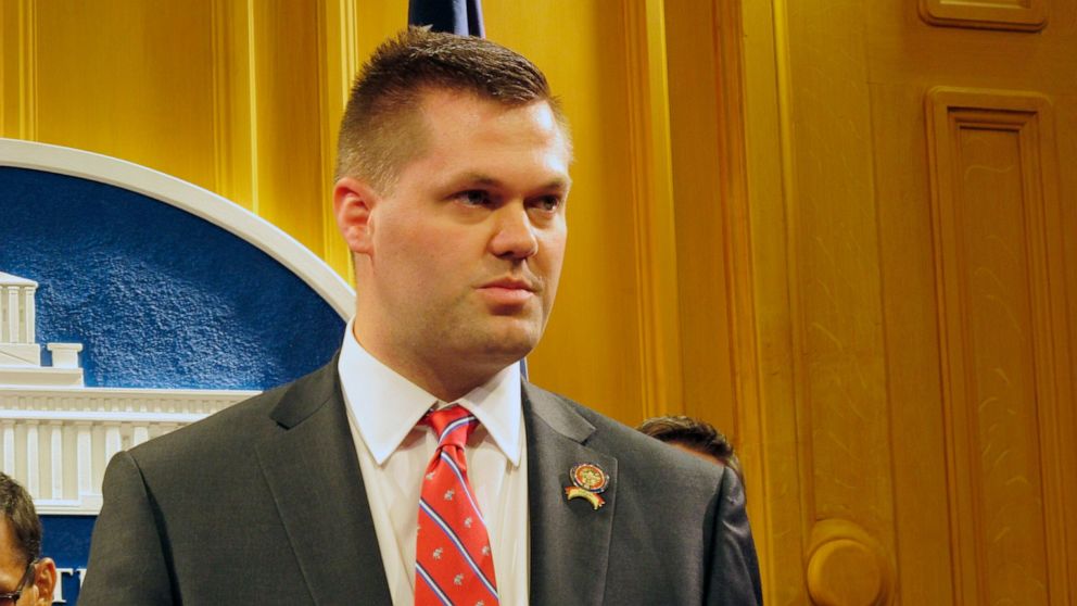 State Rep. Brett Hillyer appears at a news conference, Tuesday, June 4, 2019, in Columbus, Ohio, to discuss his legislative proposal that would create a legal opportunity for Ohio State alumni to sue the university over alleged abuse decades ago by a
