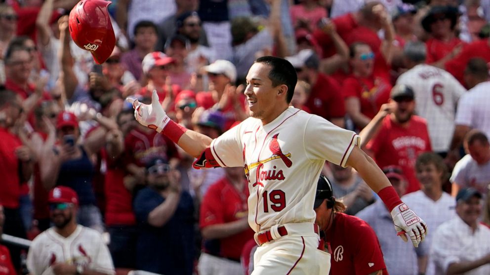 St. Louis Cardinals' Tommy Edman (19) celebrates after hitting a walk-off two-run home run during the ninth inning of a baseball game against the Cincinnati Reds Saturday, June 11, 2022, in St. Louis. The Cardinals won 5-4. (AP Photo/Jeff Roberson)
