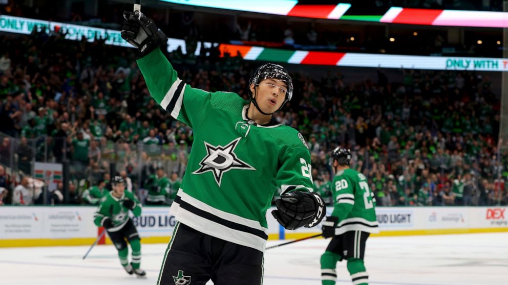 Dallas Stars left wing Jason Robertson celebrates scoring against the Washington Capitals in the first period of an NHL hockey game in Dallas, Thursday, Oct. 27, 2022. (AP Photo/Gareth Patterson)