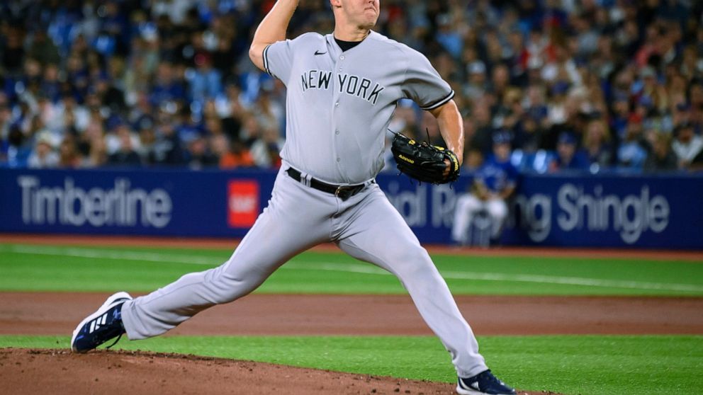 New York Yankees starting pitcher Jameson Taillon throws to a Toronto Blue Jays batter during the first inning of a baseball game Tuesday, Sept. 27, 2022, in Toronto. (Christopher Katsarov/The Canadian Press via AP)