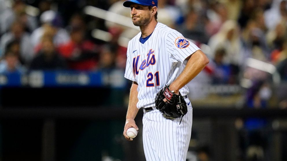 New York Mets starting pitcher Max Scherzer reacts during St. Louis Cardinals' Albert Pujols' at-bat during the sixth inning of a baseball game Wednesday, May 18, 2022, in New York. (AP Photo/Frank Franklin II)