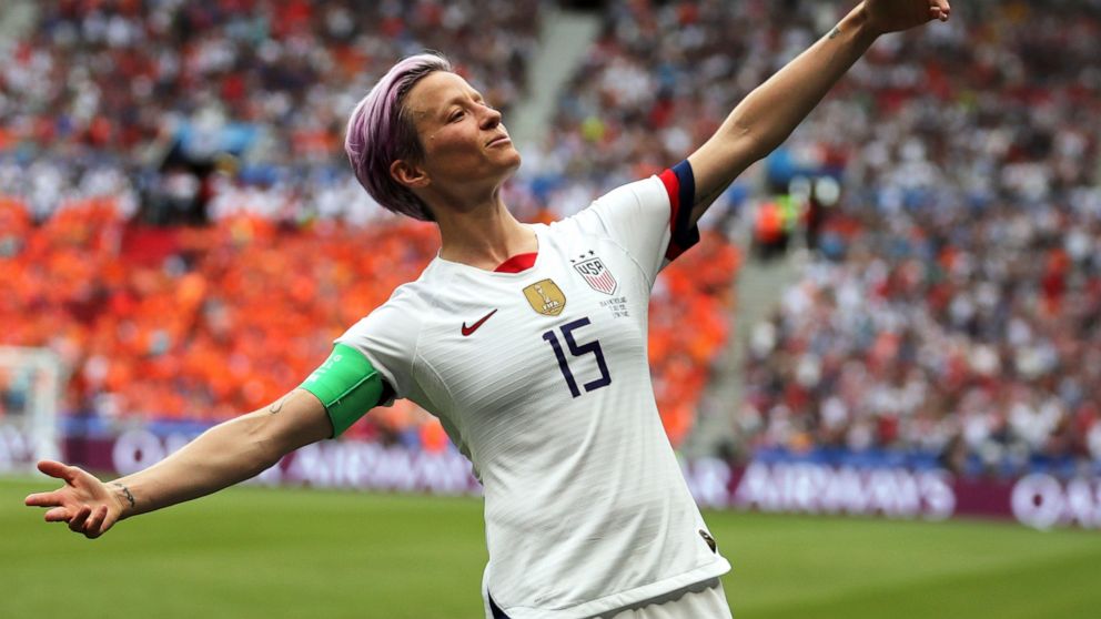 United States' Megan Rapinoe celebrates after scoring the opening goal from the penalty spot during the Women's World Cup final soccer match between US and The Netherlands at the Stade de Lyon in Decines, outside Lyon, France, Sunday, July 7, 2019. (