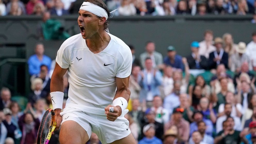 Spain's Rafael Nadal reacts after winning a point against Botic Van De Zandschulp of the Netherlands in a men's singles fourth round match on day eight of the Wimbledon tennis championships in London, Monday, July 4, 2022. (AP Photo/Alberto Pezzali)