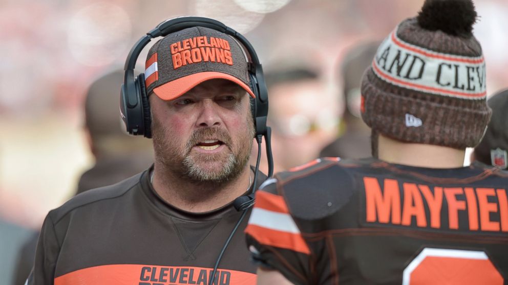 FILE - In this Nov. 4, 2018, file photo, Cleveland Browns offensive coordinator Freddie Kitchens talks to quarterback Baker Mayfield during an NFL football game against the Kansas City Chiefs, in Cleveland. A person familiar with the decision says th