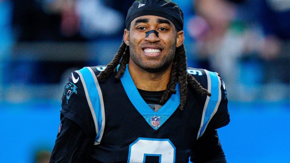FILE - Carolina Panthers cornerback Stephon Gilmore walks off the field after an NFL football game against the New England Patriots, Sunday, Nov. 7, 2021, in Charlotte, N.C. The Indianapolis Colts have solidified their secondary by signing five-time 