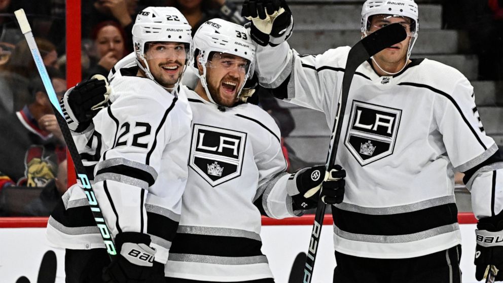 Los Angeles Kings right wing Viktor Arvidsson celebrates scoring his second goal of the game against the Ottawa Senators with teammates Kevin Fiala (22) and Matt Roy during the first period of an NHL hockey game, Tuesday, Dec. 6, 2022, in Ottawa, Ont