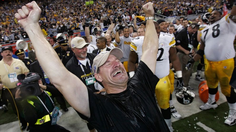 FILE - Pittsburgh Steelers head coach Bill Cowher reacts after being doused with water after the team's 21-10 win over the Seattle Seahawks in the Super Bowl XL football game in Detroit, in this Sunday, Feb. 5, 2006, file photo. Cowher, who won 149 g