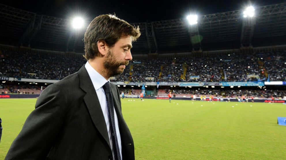 FILE - In this Sept. 26, 2015 file photo, Juventus President Andrea Agnelli arrives for a Serie A soccer match between Napoli and Juventus, at the San Paolo stadium in Naples, Italy. Juventus' board of directors and president Andrea Agnelli resigned 