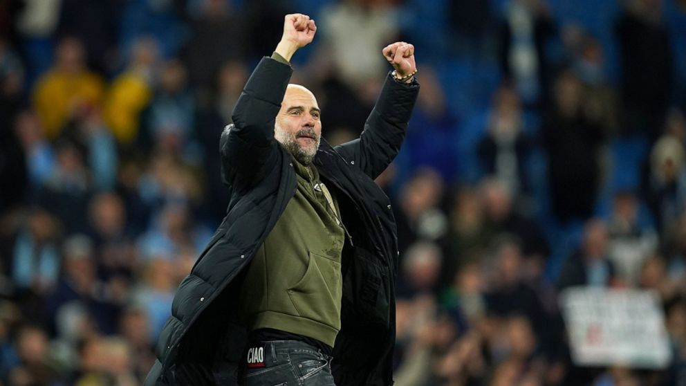 Manchester City's head coach Pep Guardiola celebrates at the end of the English Premier League soccer match between Manchester City and Fulham at Etihad stadium in Manchester, England, Saturday, Nov. 5, 2022. Manchester City won 2-1. (AP Photo/Dave T