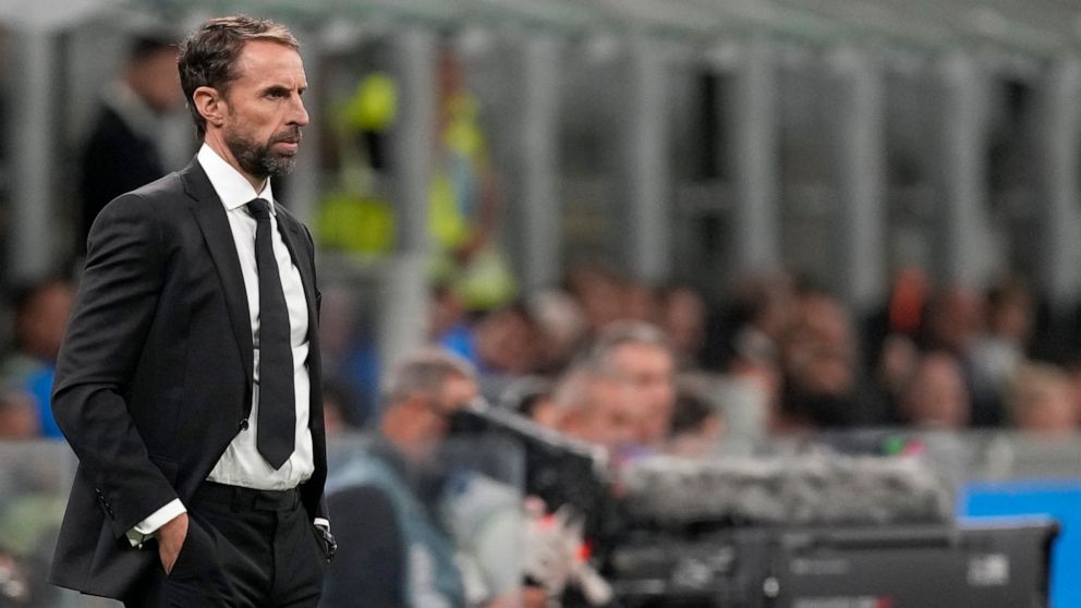 FILE - England's coach Gareth Southgate looks out during the UEFA Nations League soccer match between Italy and England at the San Siro stadium, in Milan, Italy, Friday, Sept. 23, 2022. (AP Photo/Antonio Calanni, File)