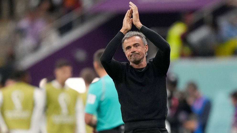 Spain's head coach Luis Enrique claps his hands during the World Cup group E soccer match between Spain and Germany, at the Al Bayt Stadium in Al Khor , Qatar, Sunday, Nov. 27, 2022. (AP Photo/Matthias Schrader)
