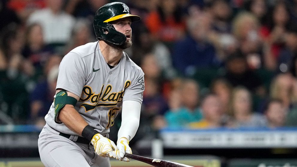 Oakland Athletics' Seth Brown watches his three-run home run against the Houston Astros during the fifth inning of a baseball game Saturday, Sept. 17, 2022, in Houston. (AP Photo/David J. Phillip)
