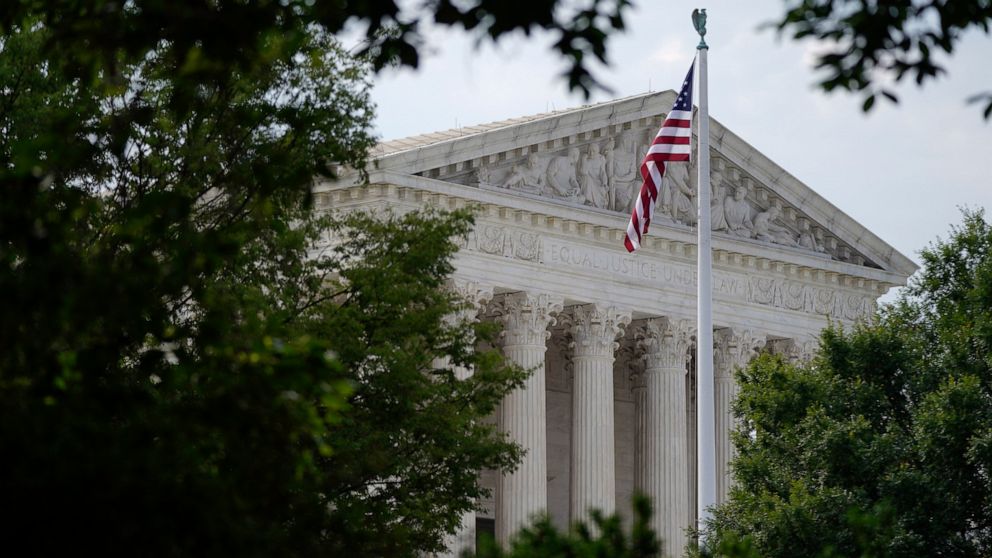 An American flag waves in front of the U.S. Supreme Court building, Monday, June 27, 2022, in Washington. (AP Photo/Patrick Semansky)