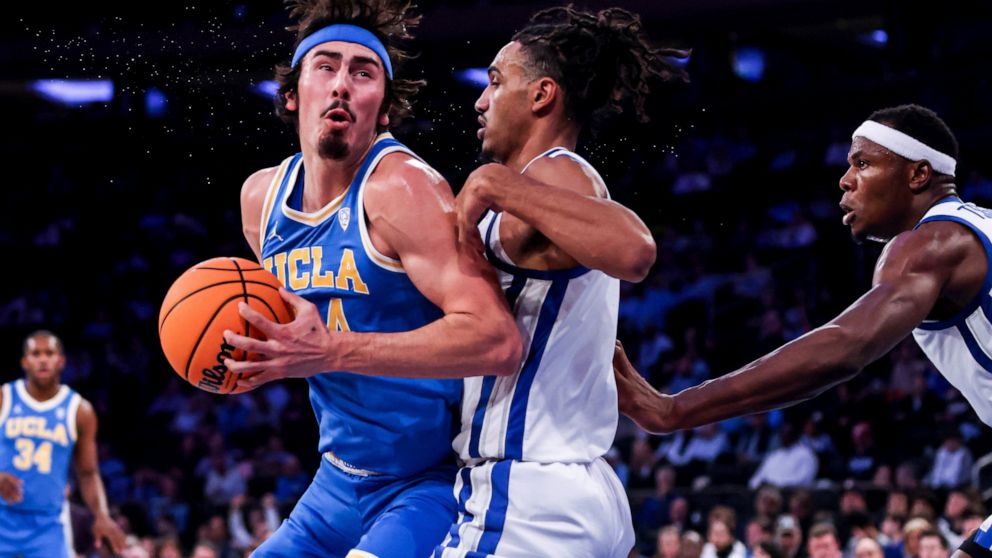 UCLA guard Jaime Jaquez Jr. prepares to shoot during the first half of an NCAA college basketball game against Kentucky in the CBS Sports Classic, Saturday, Dec. 17, 2022, in New York. (AP Photo/Julia Nikhinson)
