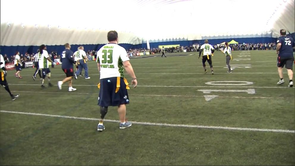 PHOTO: The Wounded Warrior Amputee Football Team defeated the NFL team, 63-42, improving its record to 7-0 against the NFL team in pre-Super Bowl bouts.